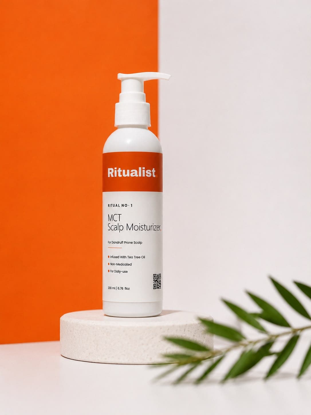Ritualist MCT Scalp Moisturizer on pedestal with tea tree